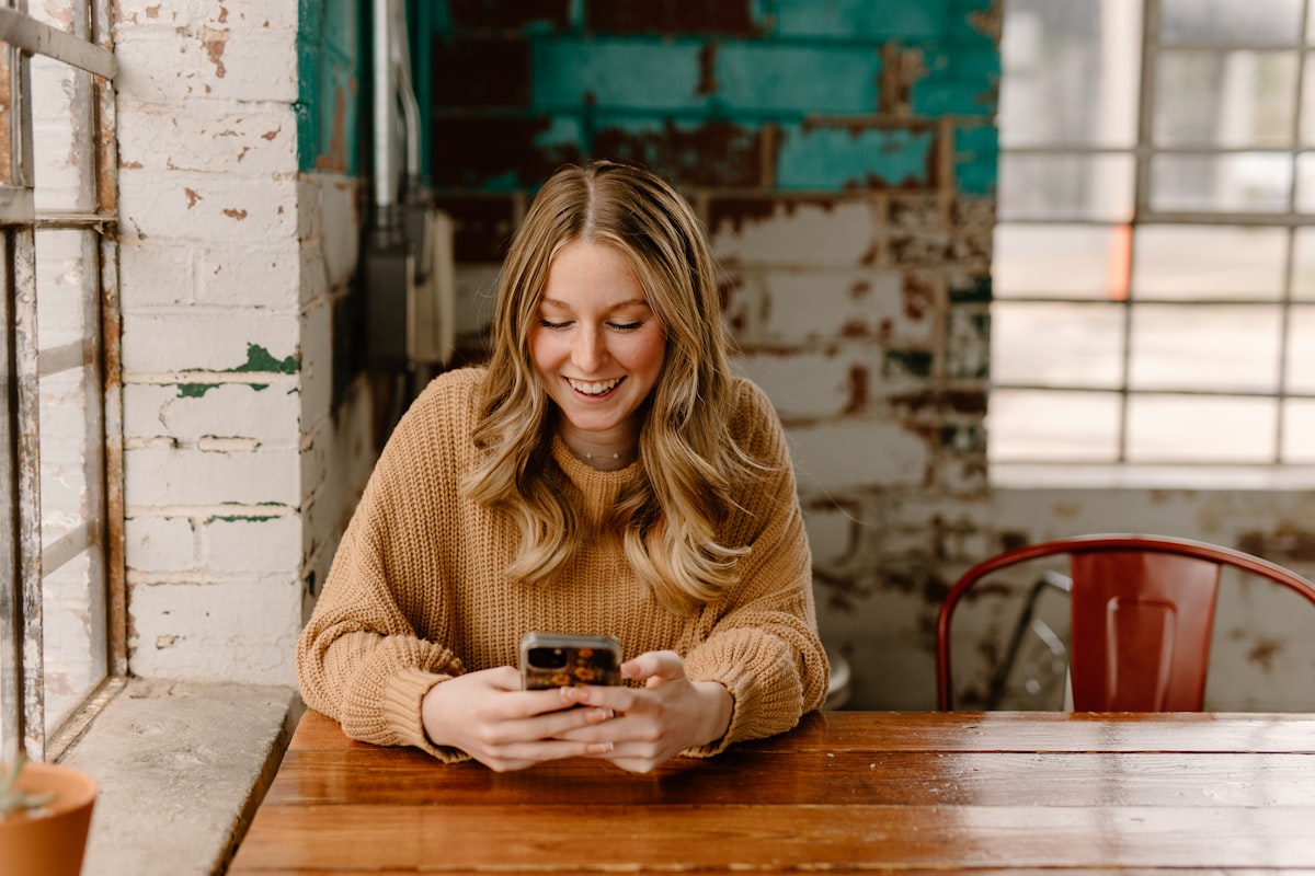 woman using mobile app on phone